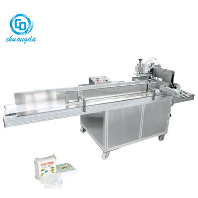 China Baby diaper packing P: CDH-350-M baby diaper packing machine, baby diaper machine for sale