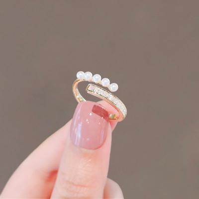 China Fashion Light Luxury Personality Design Ring Imitation Pearl Women's Open Niche Index Ring for sale