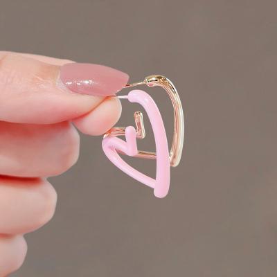 China Fashion Luxury Pop Jewelry Metal Cutout Irregular Circle Vintage Circle Earrings Matte Small Clip Stud Earrings for sale