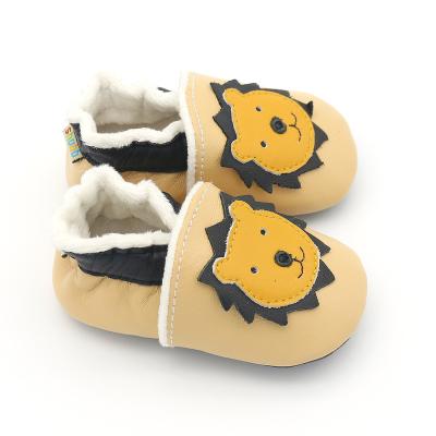 China Indoor soft-soled warm shoes and autumn and winter waterproof sheepskin leather slippers and baby toddler outdoor for sale