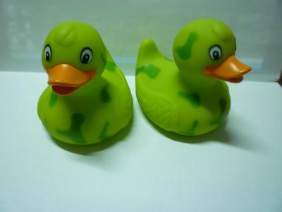 China Phthalate Free Letter Printed Weighted Rubber Ducks Toy With Camouflage Design for sale