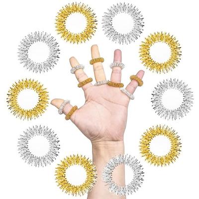 China Hot Selling New Product Finger Ring Mini Massage Finger Acupressure Massage Rings Hand Stirring Toy for sale