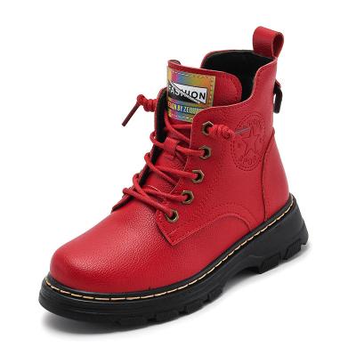 China Unique Deodorization Boys and Girls Martin Boots New Autumn Winter Cowhide Boots Soft Cotton Casual Boots for Kids Tend Black Leather Shoes for sale