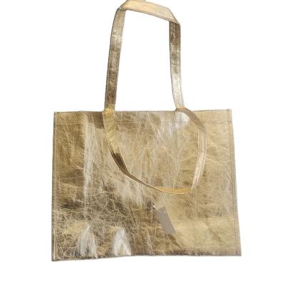 China Recyclable Gold Color Kraft Paper Shopping Bag With Handle for sale