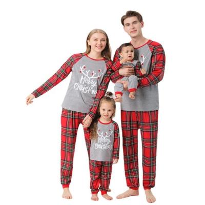 China Thermal Customize Newest Family Matching Printed Pajamas Kids Long Sleeves Red And Green for sale