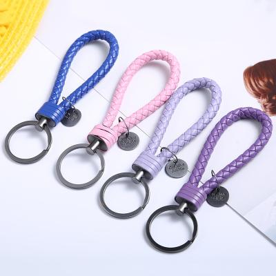 China Custom logo llaveros leather manufacturer Multicolor weaves knitting leather key chain tungsten rings metal key chains for sale