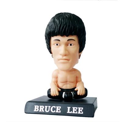 China Promotional High Quality Action Number Plastic Doll Bruce Lee kongfu head Europe Flip Bobbleheads Plastic Crafts for sale