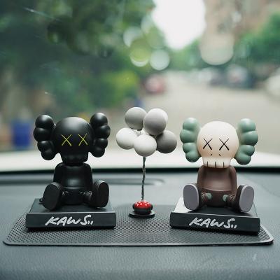 China Hot Promotional 2022 America Phone Holder Color Bobblehead Doll Shaking Head Phone Holder Car Decoration Toy Car Phone Holder for sale