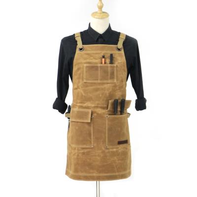 China Heavy Duty Waxed Canvas Work Cleaning Apron With Tool Bag Adjustable Cross Strap Carpenter Apron for sale