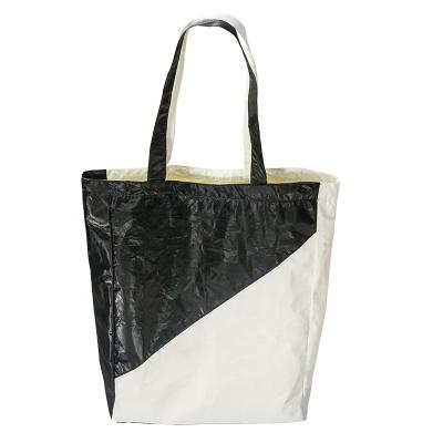 China Dupont AZO free large capacity portable paper shopping bag black and white tyvek stitching bag for sale