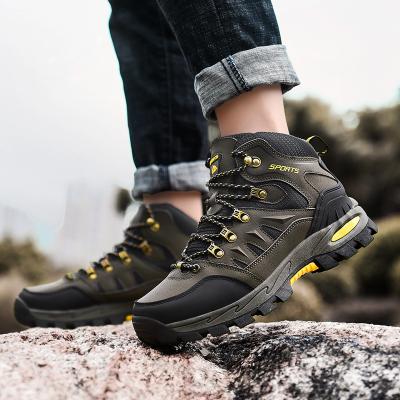 China Abrasion Resistance Hiking Shoes Outdoor High Ankle Boots Men Waterproof Anti-Slip Wearable Unisex Climbing Mountain Climbing Shoes Sports Sneakers Women for sale