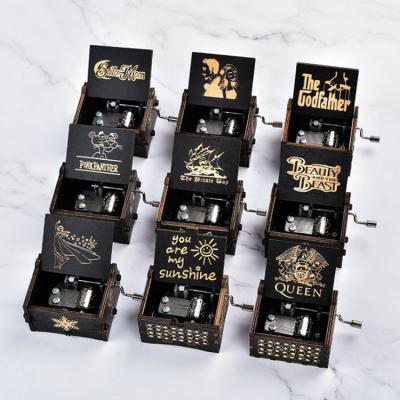 China Hot Sale OEM Black Color Hand Crank Mini Custom Diy Wooden Music Box for sale