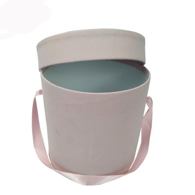 China Handmade Custom Pink Suede Ribbon Handle Caja Para Flores Cardboard Round Flower Paper Packaging Box for sale