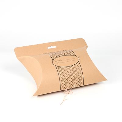 China Good Price Recycled Materials Custom Kraft Paper Pillow Box With Handle for sale