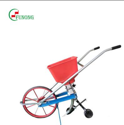 China Pupil Mini Hand Push Corn Seed Planting Planter with Manual Fertilizer Seeder Machine for sale