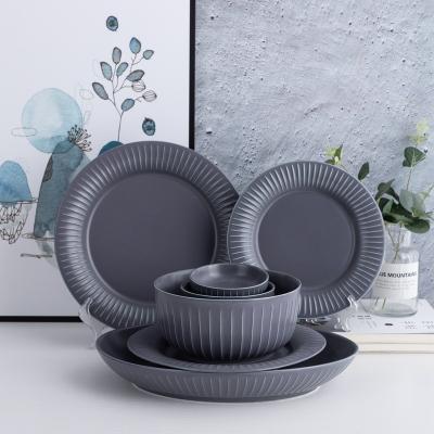 China Sustainable Western Style Gray With Gold Ceramic Rim Plate Bowl Dishes Spoon Dinnerware Set for sale