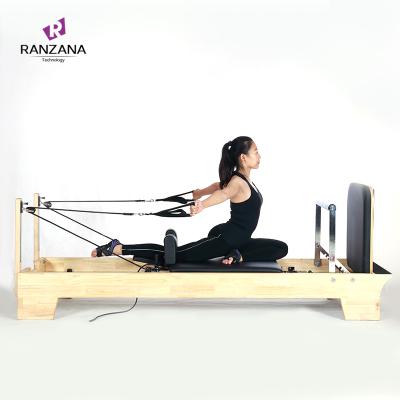 China Durable Home Exercise Wood Body Balance Professional Pilates Reformer White Oak Pilates Core Training Bed Custom Made for sale