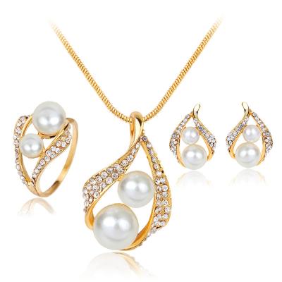 China 2021 ethnic newest gold filled shinny necklace rhinestone with pearl jewelry set necklace ring set and earrings jewelry for party for sale