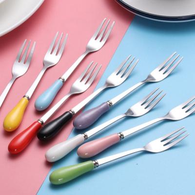 China Viable factory wholesale china handle stainless steel fruit fork three-tooth household fruit toothpick cartoon cake moon cake fork for sale