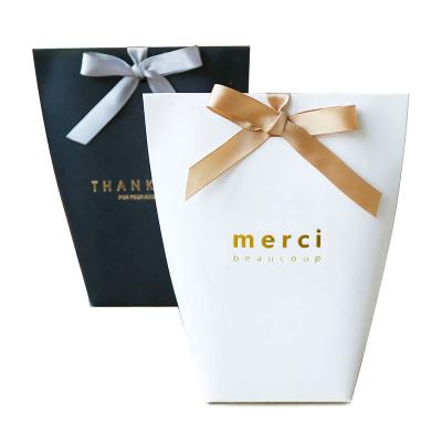 China Recycled Materials Candy Bags With Ribbon Black White Kraft Paper Bag Bronzing French 