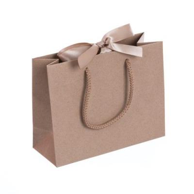 China New Recycled Materials Design Personalized Recyclable Custom Gold Paper Bag Custom Shopping Bag For Gift Apparel Apparel Packages for sale