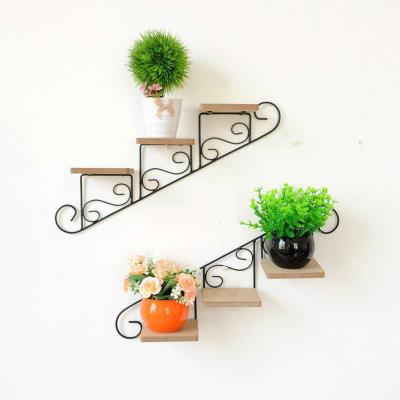 China Home decoration .office wall decoration,wall hanging,stair type small iron potted plant shelf decoration does not occupy space for sale