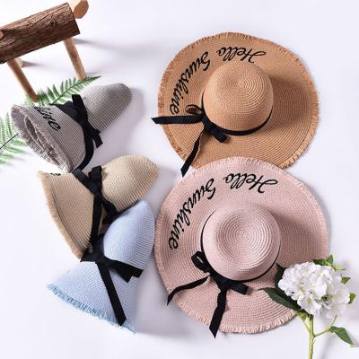 China 2021 new summer sun beach hat wide barred brim straw hat foldable flying frame embroidery letters for sale