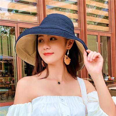 China Custom Sun Striped Wide Foldable Bucket Hat Women Brim Lady Brim Hats for sale