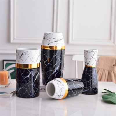 China Wholesale New Design Modern Design High Quality Luxury High Quality Modern Porcelain Flower Vase Black White Marbled Gold Home Decor for sale