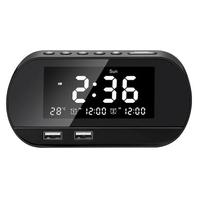 China Hotel Radio FM Table Clock Dual USB Port Alarm Smart Charging Digital Pendulum Clock With Temperature for sale