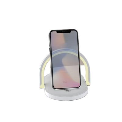 China New Creative Fast Night Light Mobile Phone Charger 15W Table Lamp Wireless Fast Charging Treasure With Mobile Phone Bracket for sale