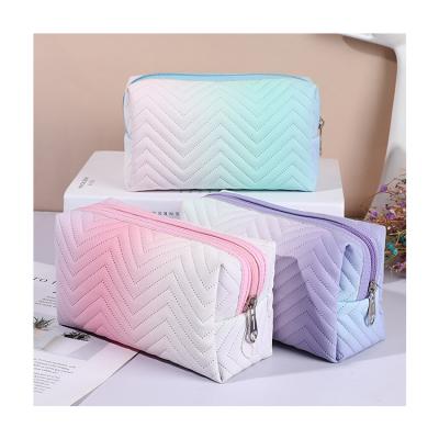 China Fashion RU Cosmetic Bag Waterproof PU Gradient Color Toiletry Bag Women Vegan Leather Travel Cosmetic Bag for sale