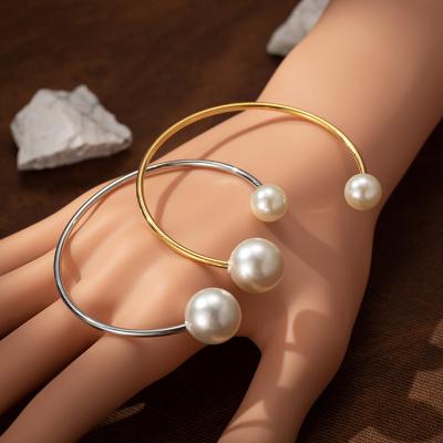 China TRENDY Minimalist Ladies Bracelets Bangle Alloy Layered Pearl Bracelet Gold Asymmetrical Opening Lady Bangle Jewelry Women for sale