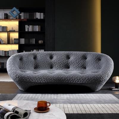 China Shaped And Stylistic Modern Special Fabric Shell Tufted Couches Living Room Italy Luxury Sofas for sale