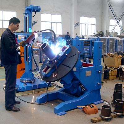 China Building material stores Zhouxiang pipe clamp manipulator 3.5mx5m column and boom welding price for sale