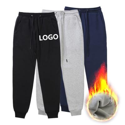 China custom Anti-wrinkle logo sweatpants printed simple mens jogging pants masks unisex track pants mows mens joggers winter pants mens sweatpants for sale