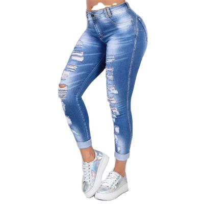 China S-6XL workable viable fashion ripped causal lady's jeans elastic waist high slim pants wholesales women's jeans long pants for sale