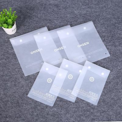 China Recyclable EVA Cosmetic Bag Button Closure Style Transparent Travel Makeup Bag for sale