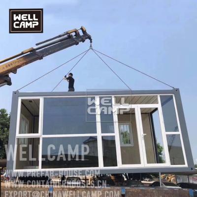 China Wellcamp Low Cost Flat Pack Container Home Site Construction Office Sandwich Panel Modern Portable Office Booth for sale