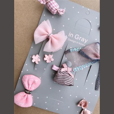 China 2021 Viable Hot Sale Lace Bow Candy Shape Dog Hairpin Set Exquisite Wrapping Pet Accessories for sale