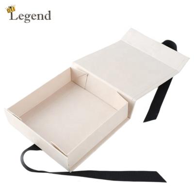 China Recyclable Custom CMYK Printing Ship By Flat Packaging Clothes Garment Shopping Folding Gift Boxes With Ribbon for sale