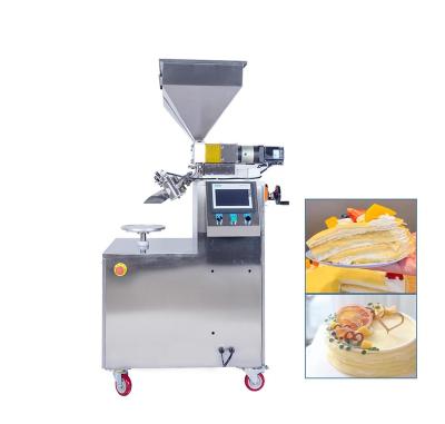 China High Productivity Commerical Manual Decorating Spreader Filling Cream Coating Automatic Two Station Round Cake Decorations Machine for sale