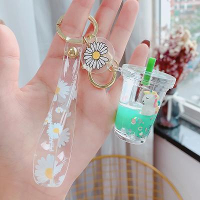 China Crystal Unicorn Glitter Quicksand Liquid Key Unicorn Liquid Quicksand Keychain Milk Chain Floating Teacup for sale