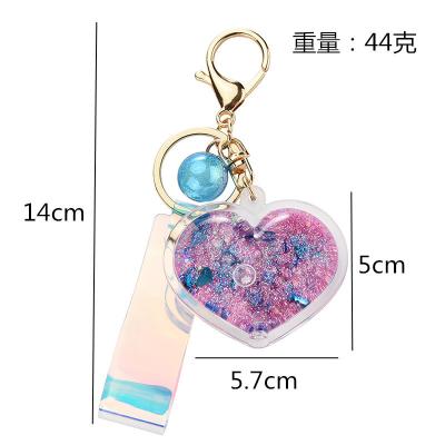 China Crystal Fashion Heart Shape Move Glitter Quicksand Key Chain Oil Key Chains Couples Men Women Gifts Bag Dangling Liquid Key Chains for sale