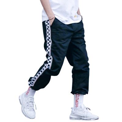 China Custom Anti-Static Streetwear Man Hip Hop Printed Tape Cargo Pants Men's Panties Reflective for sale