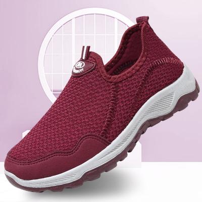 China Fashion trend fashion fly weave upper sports shoes woman walking casual women sneakers bangs sports shoes for sale