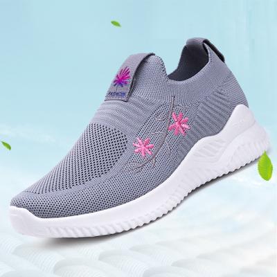 China Fashion trend design fly new knitted shoes women's air cushion shoes walking sock sports shoes for women for sale