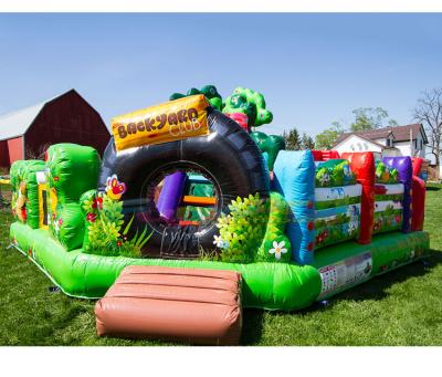 China Outdoor entertainment bouncing castles combo jumping house with slide jungle tree inflatable amusement park for sale