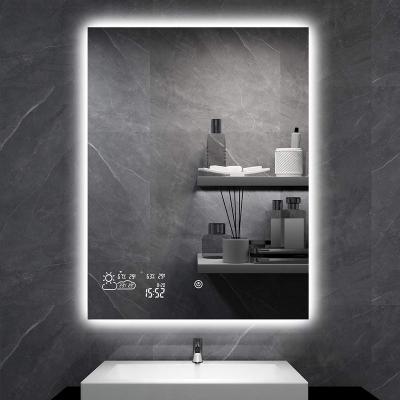 China Modern Virtual Wall Mount Magnifying Smart Light Up Led Bathroom Mirror With Time Display for sale