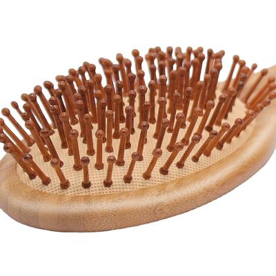 China Comfortable Wholesale Bamboo Hair Comb Bamboo Hair Brush Detangling Hair Brush for sale